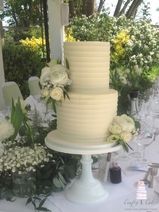 2 tier buttercream wedding cake fresh flowers